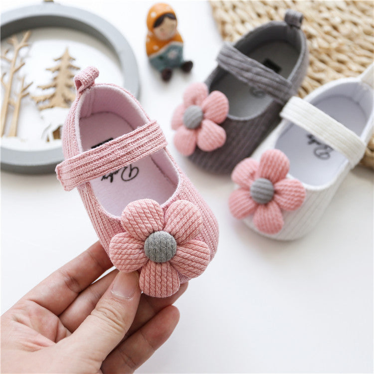 Comfy Baby Shoes & Smart Socks for Tiny Feet 👟🧦 - Cute pink baby shoes with flower decoration.