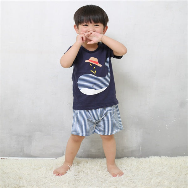 Boys' Collection: Playful Styles for Little Explorers 🚀👦 - Cute boy in playful outfit with whale design.
